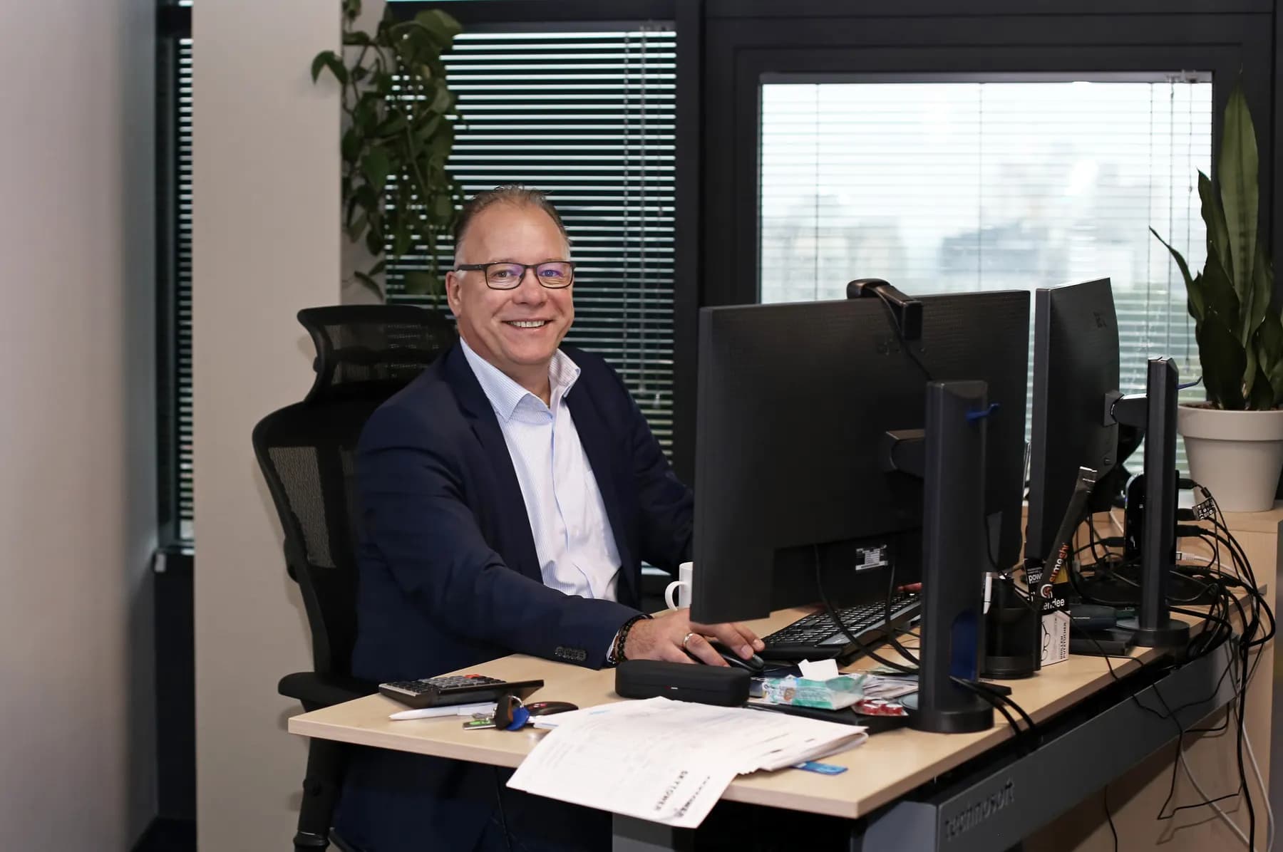 An Addcode colleague at their desk in the Chișinău office